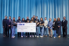 CREEED and SISD leadership recognize teachers from Spc. Rafael Hernando III Middle School with a large check as part of the 3rd Annual AIM High initiative.